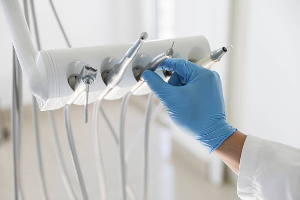 Professional Tooth Extraction technician working in Mundelein, IL